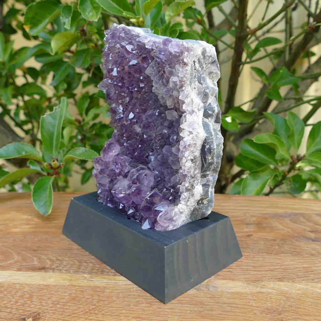 amethyst cluster on wood base