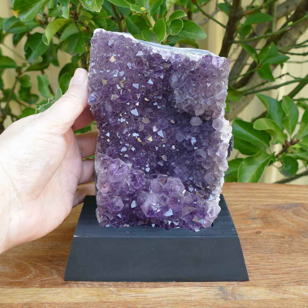 amethyst cluster on wood base