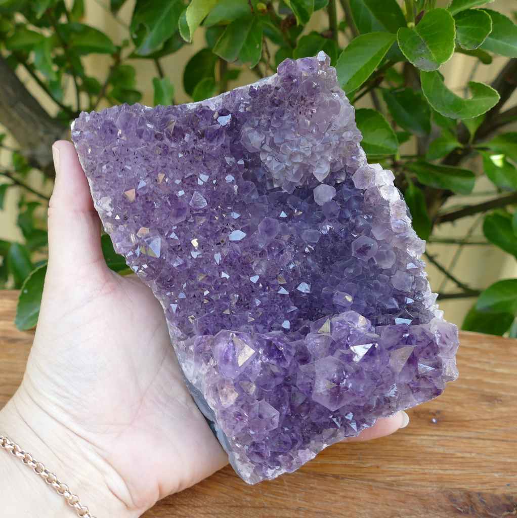 amethyst cluster on wood base