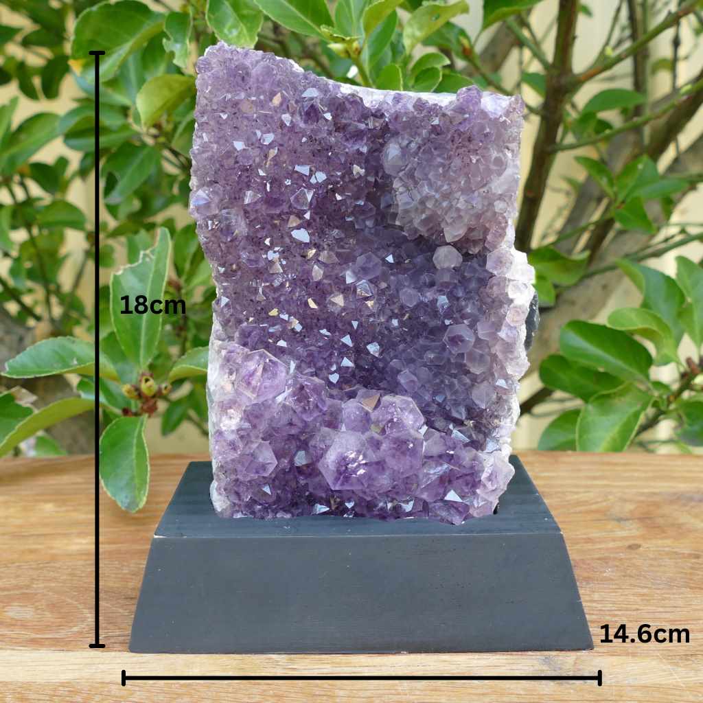 amethyst cluster on wood base