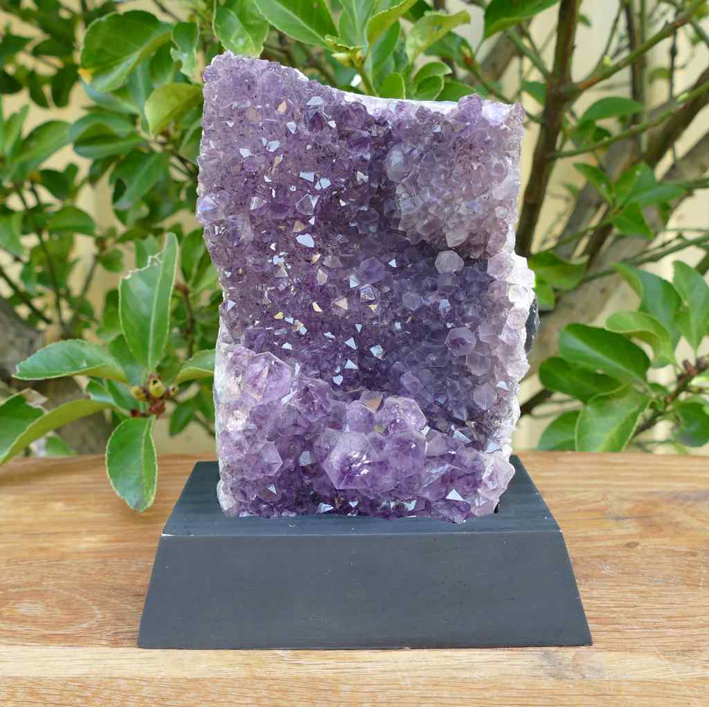 amethyst cluster on wood base