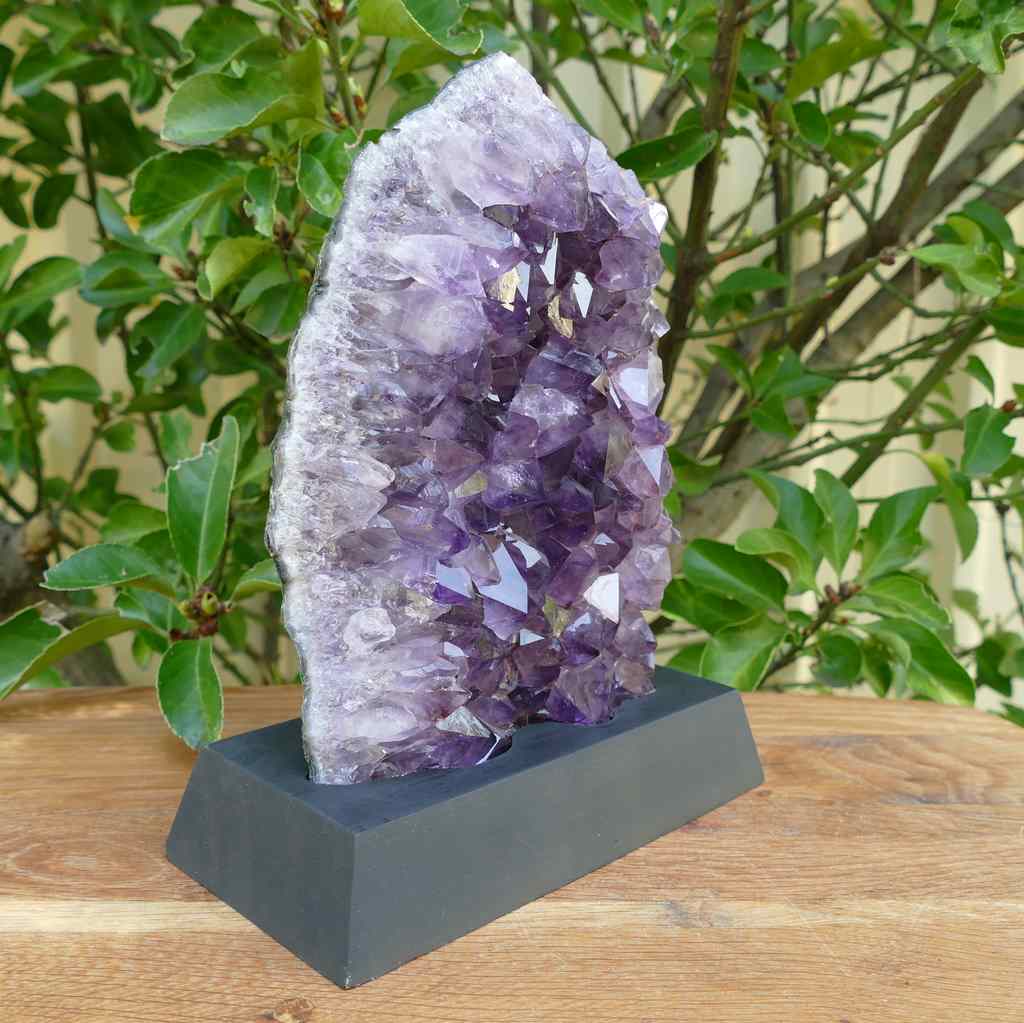 amethyst cluster on wood base