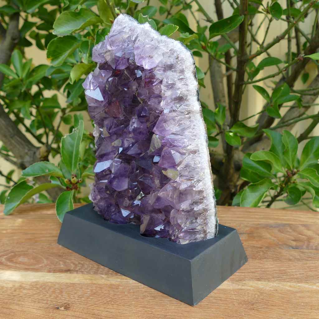 amethyst cluster on wood base