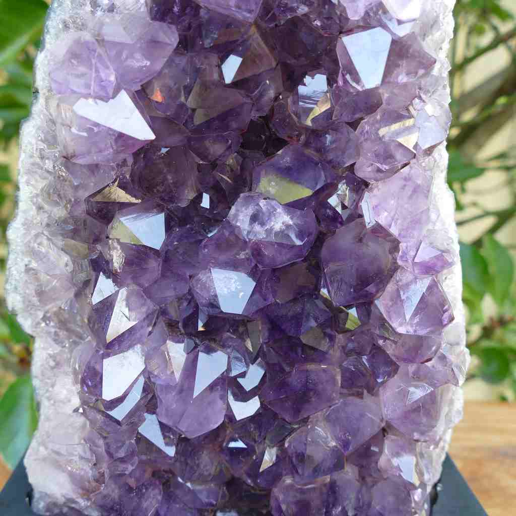 amethyst cluster on wood base