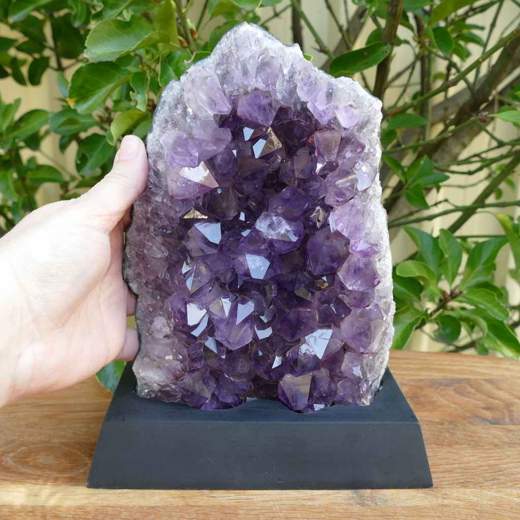 amethyst cluster on wood base