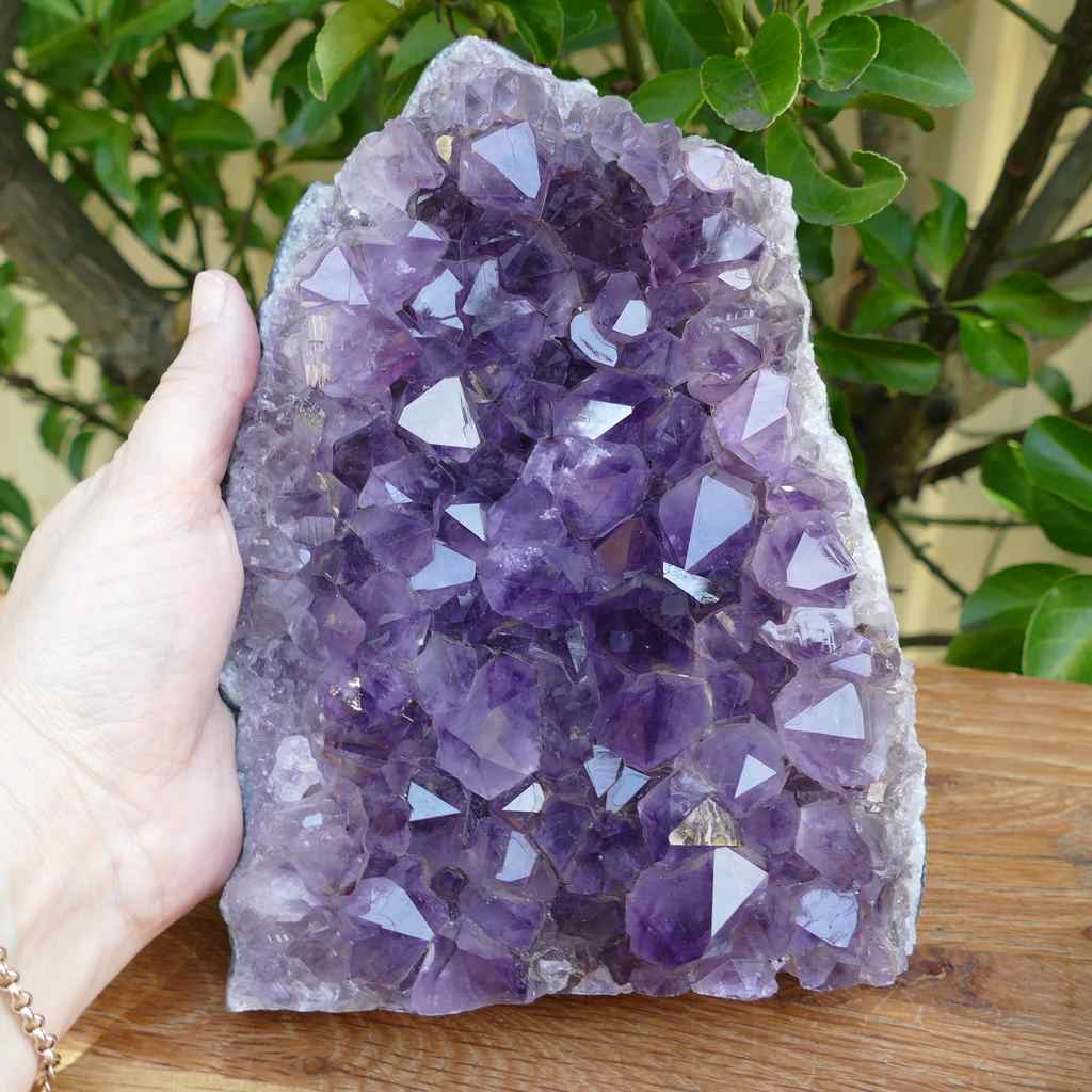 amethyst cluster on wood base