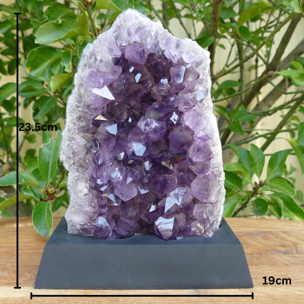 amethyst cluster on wood base