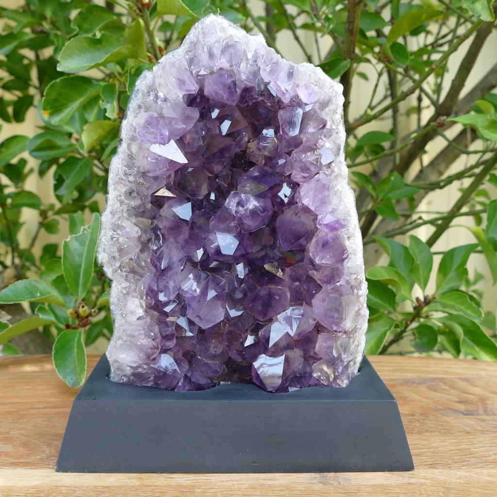 amethyst cluster on wood base