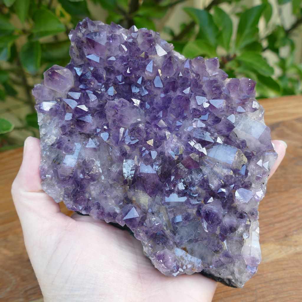 amethyst cluster on metal stand