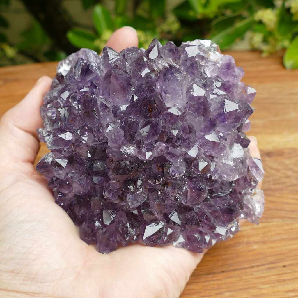 amethyst cluster on metal stand