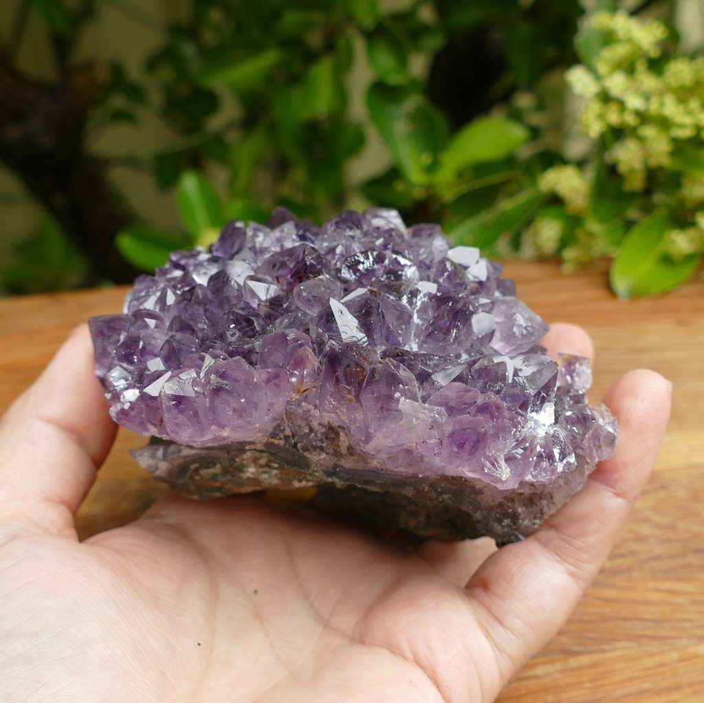 amethyst cluster on metal stand