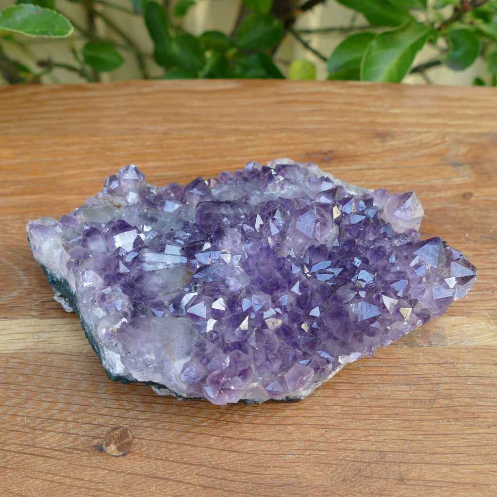 amethyst cluster on metal stand