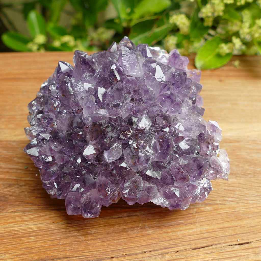 amethyst cluster on metal stand