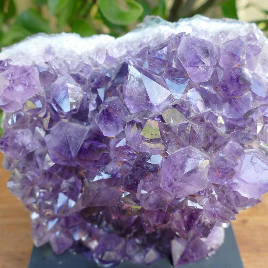 amethyst cluster on wood base