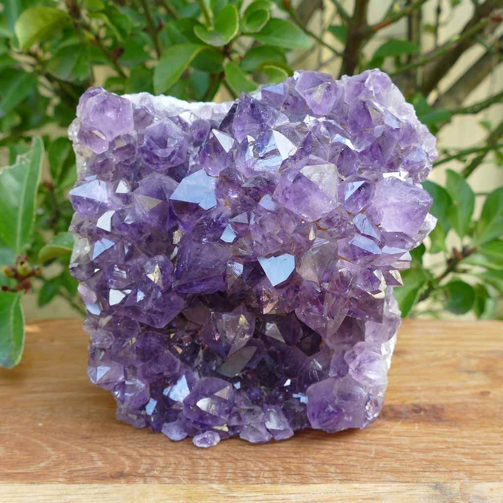 amethyst cluster on wood base