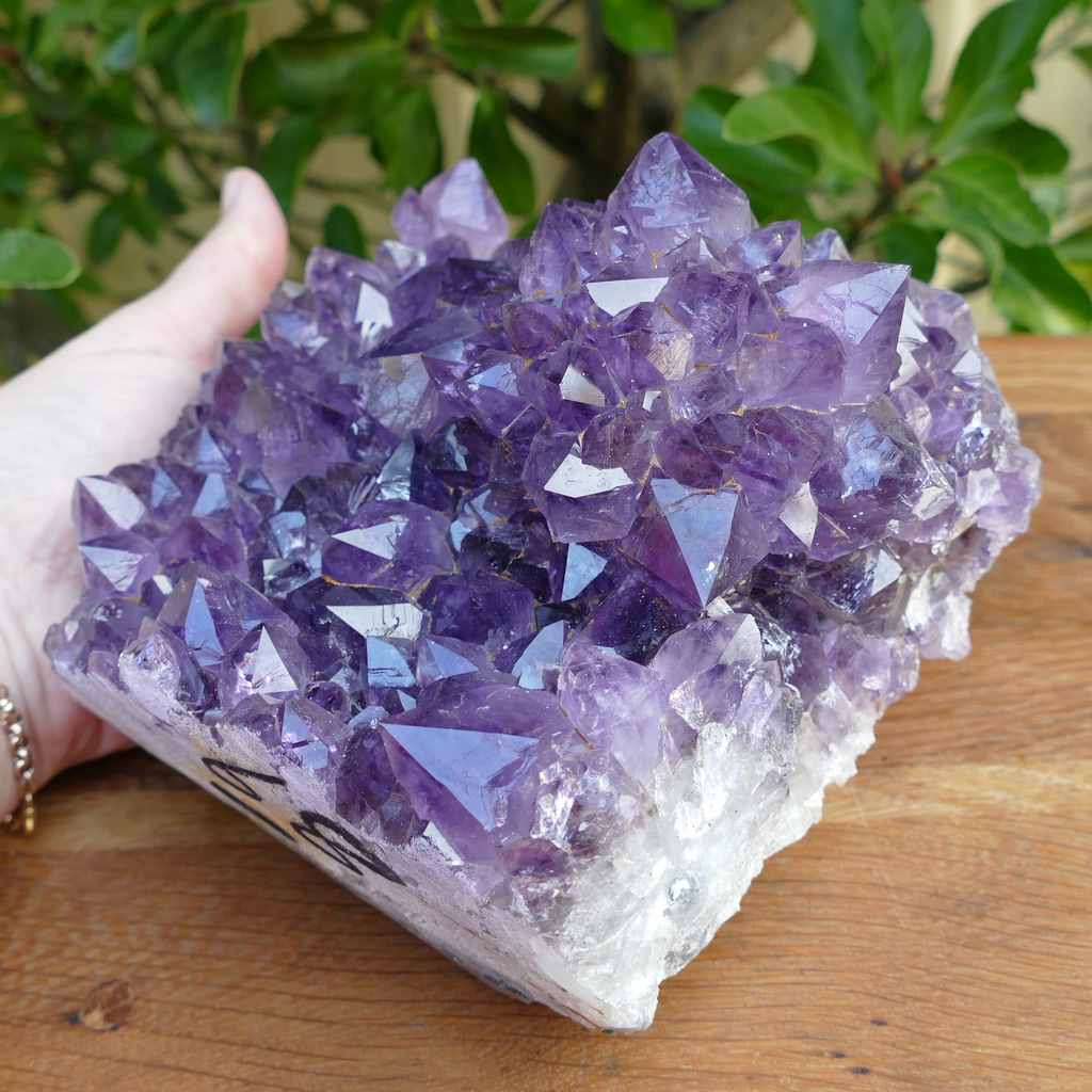 amethyst cluster on wood base