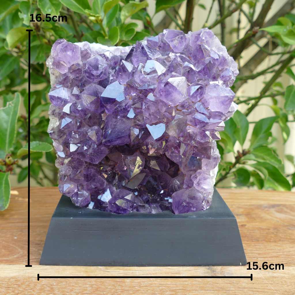 amethyst cluster on wood base