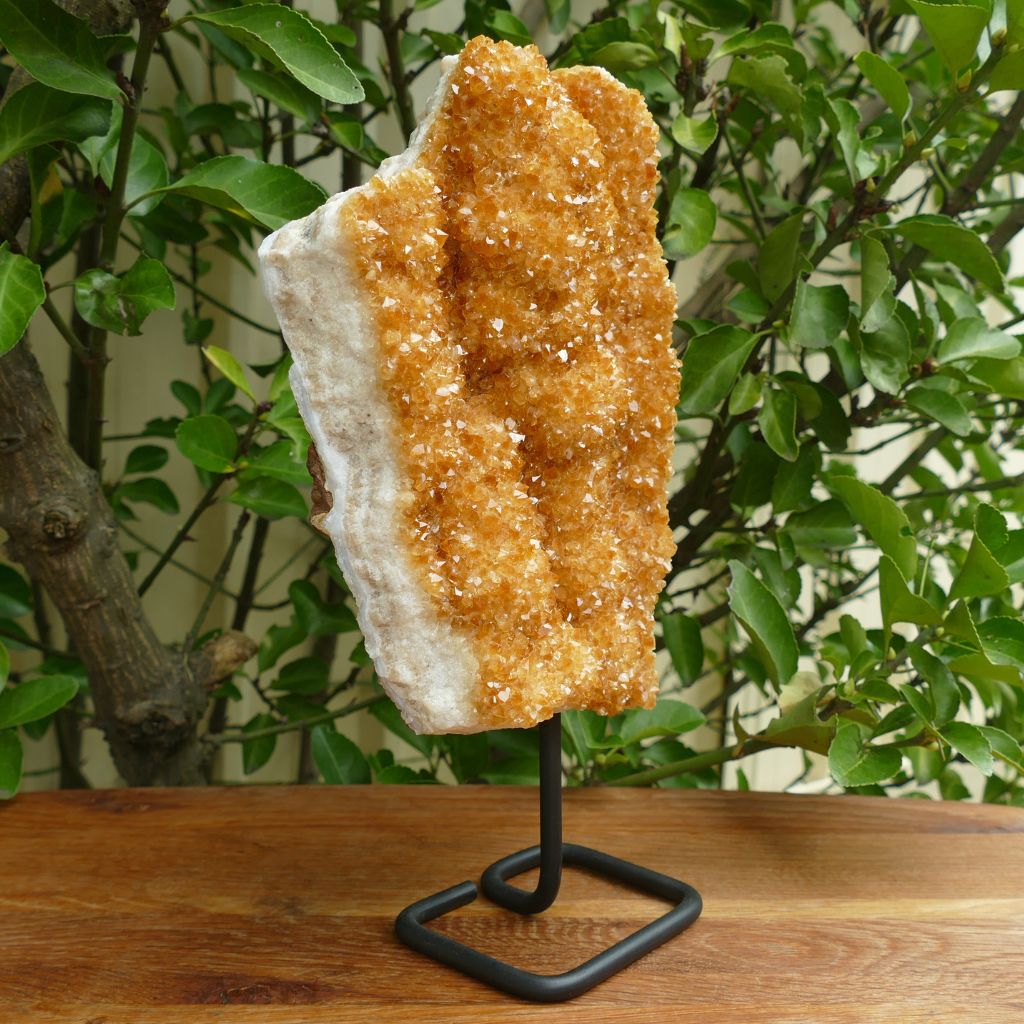 large citrine cluster on metal stand