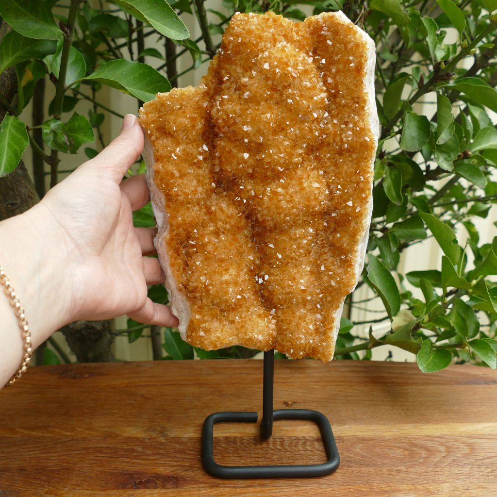 large citrine cluster on metal stand
