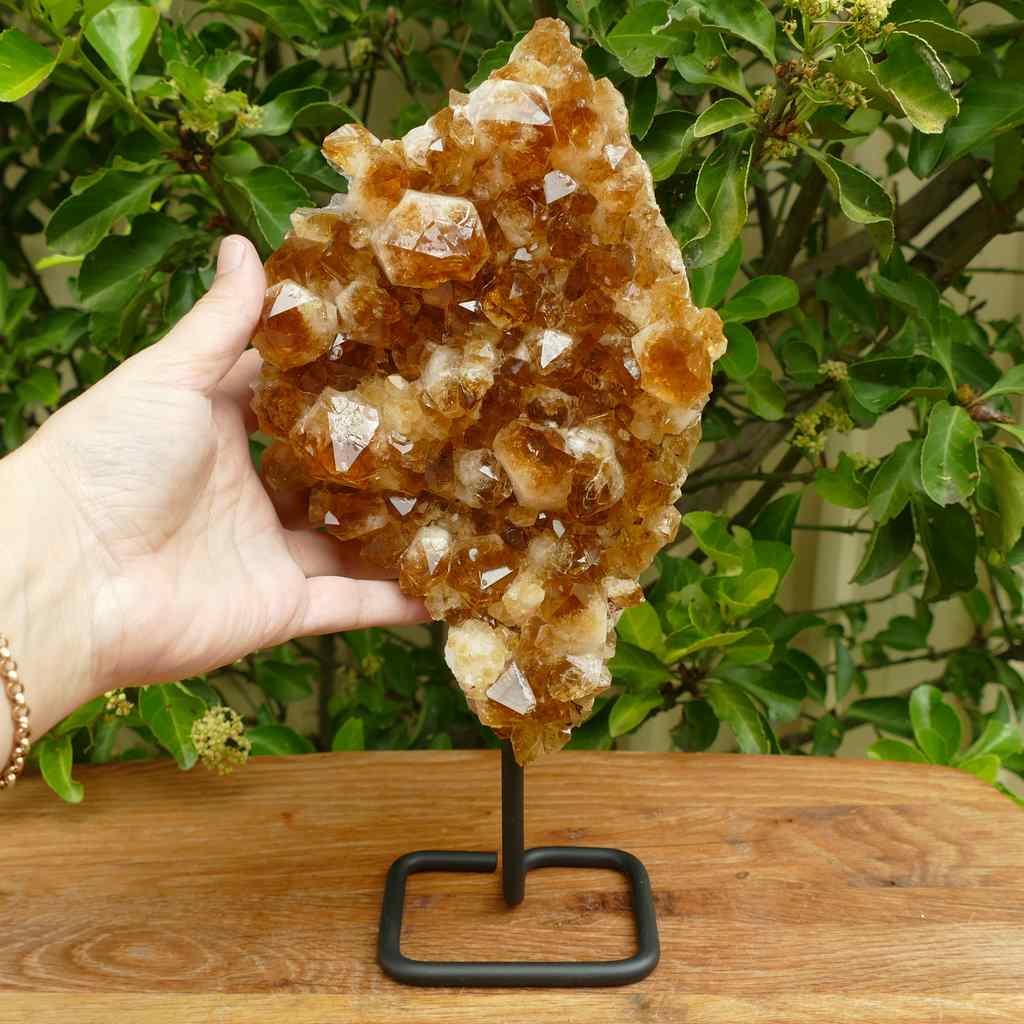 citrine cluster on metal stand