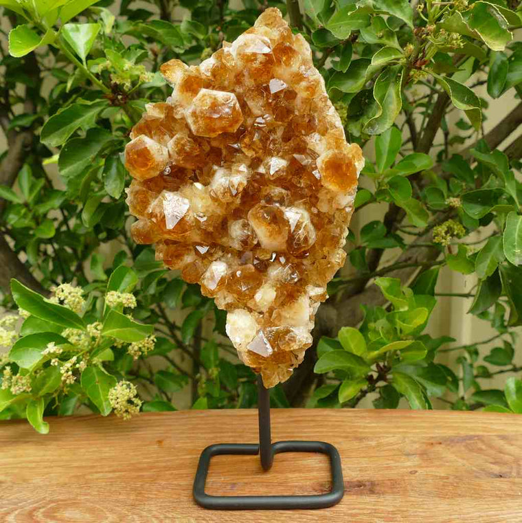 citrine cluster on metal stand