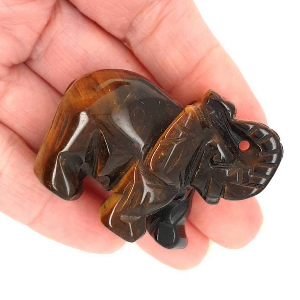 crystal carved elephant tigers eye