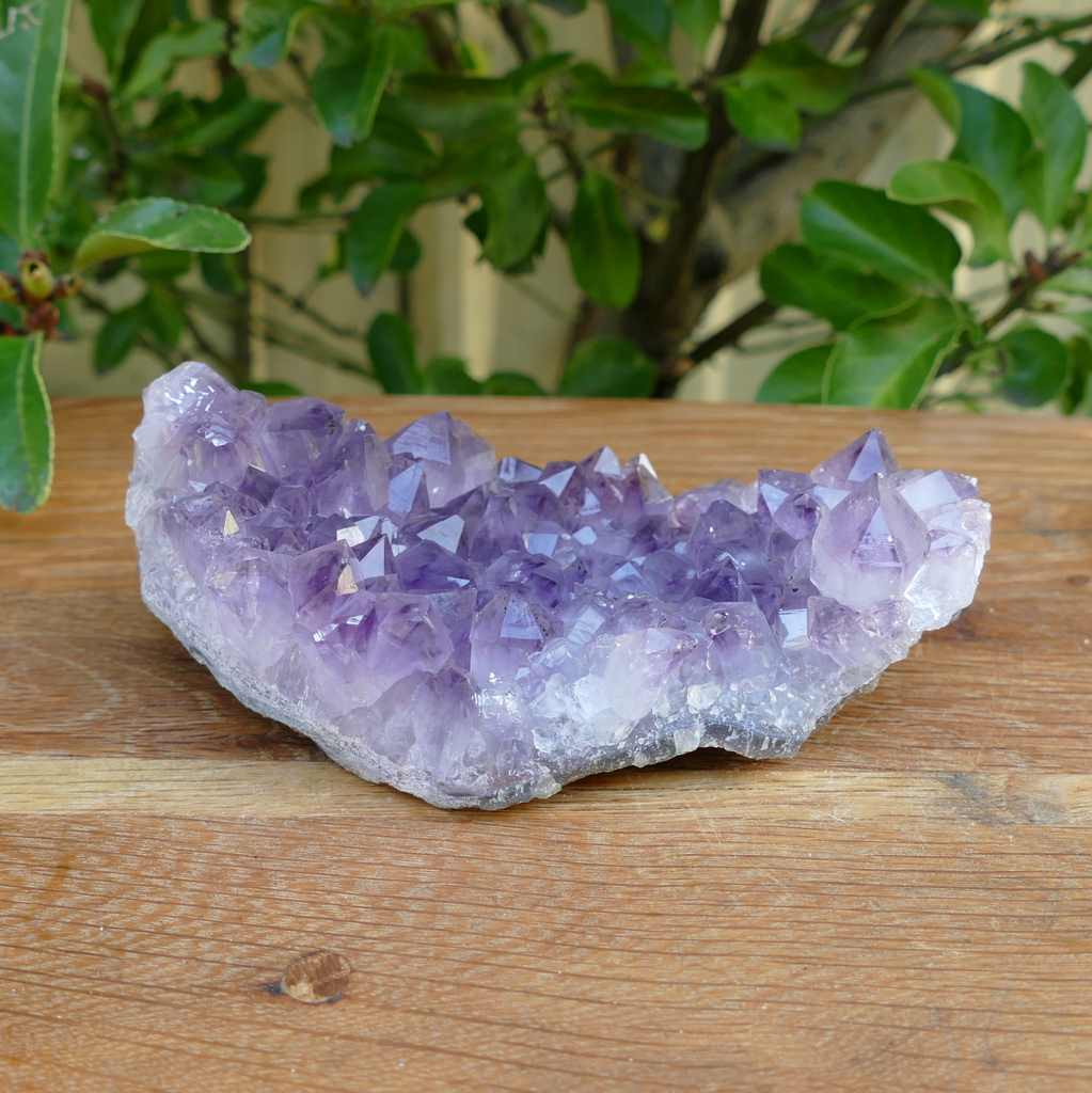 amethyst cluster on metal stand