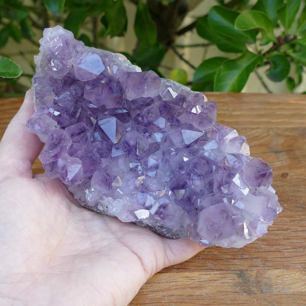 amethyst cluster on metal stand