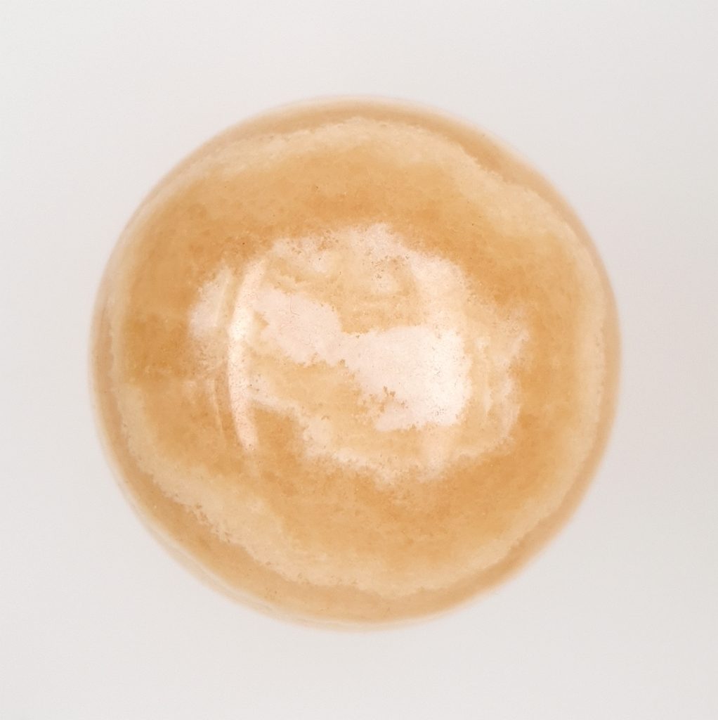 orange banded calcite crystal sphere