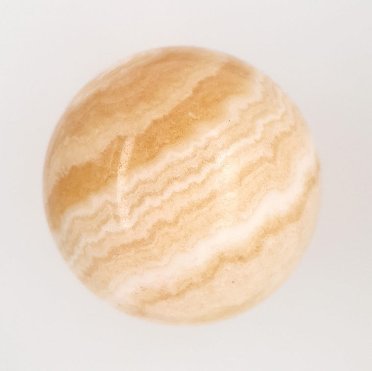 orange banded calcite crystal sphere