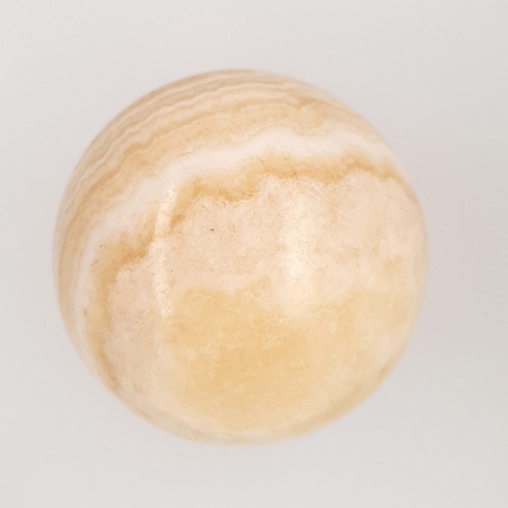 orange banded calcite crystal sphere