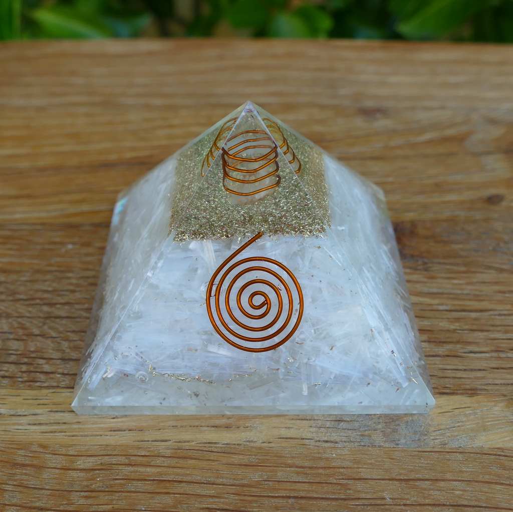 orgonite pyramid with selenite crystals