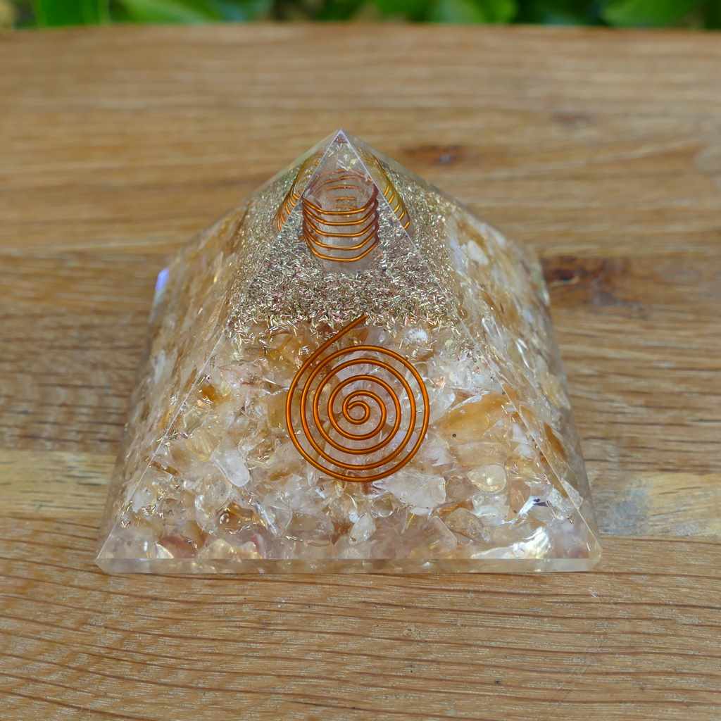 orgonite pyramid with citrine crystals