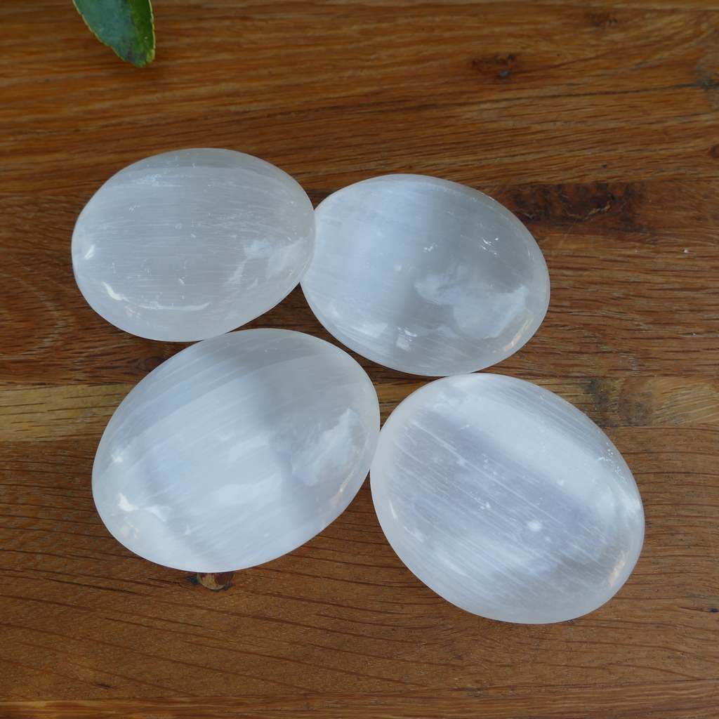 selenite palm stones