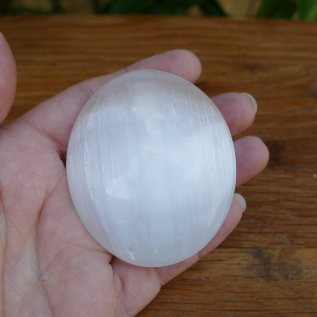 selenite palm stones