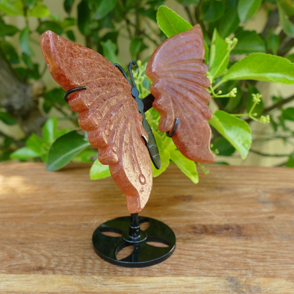 strawberry quartz butterfly wings on stand