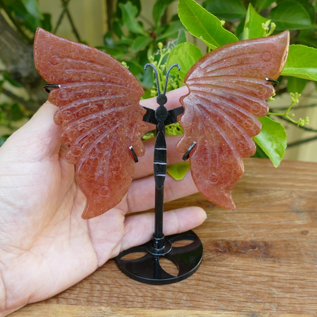 strawberry quartz butterfly wings on stand