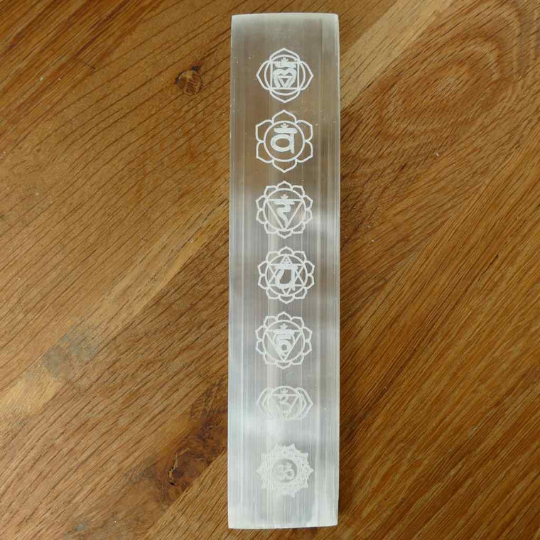selenite ruler with engraved chakra symbols